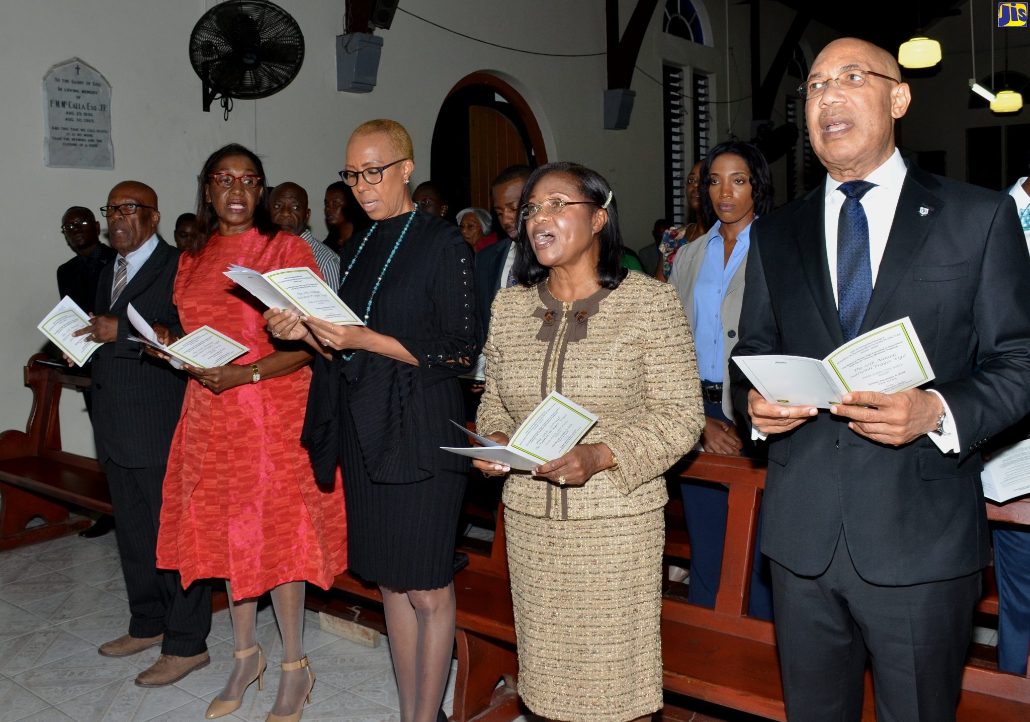 Governor-General, His Excellency the Most Hon. Sir Patrick Allen (right) and Lady Allen (second right), are joined by (from left) Chairman, National Prayer Vigil Committee, Rev. Dr. Roy Henry; Custos Rotulorum of St. Thomas, Hon. Marcia Bennett; and Minister of Science, Energy and Technology, Hon. Fayval Williams, in worship at the 27th annual national prayer vigil, held on December 8 at the Coke Methodist Church, Morant Bay, St. Thomas.
