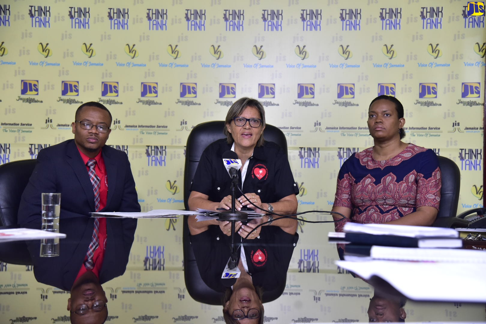 Executive Director at the Heart Foundation of Jamaica (HFJ), Deborah Chen (centre), addresses a JIS ‘Think Tank’ on January 29, to launch Heart Month, which will be observed during February under the theme ‘High Blood Pressure and the Untold Damage to Kidneys’.  With  Mrs. Chen are Consultant Cardiologist at the HFJ, Dr. Handel Emery (left), and Deputy Head of Medicine, Kingston Public Hospital, Dr. Davlyn Dewar. 