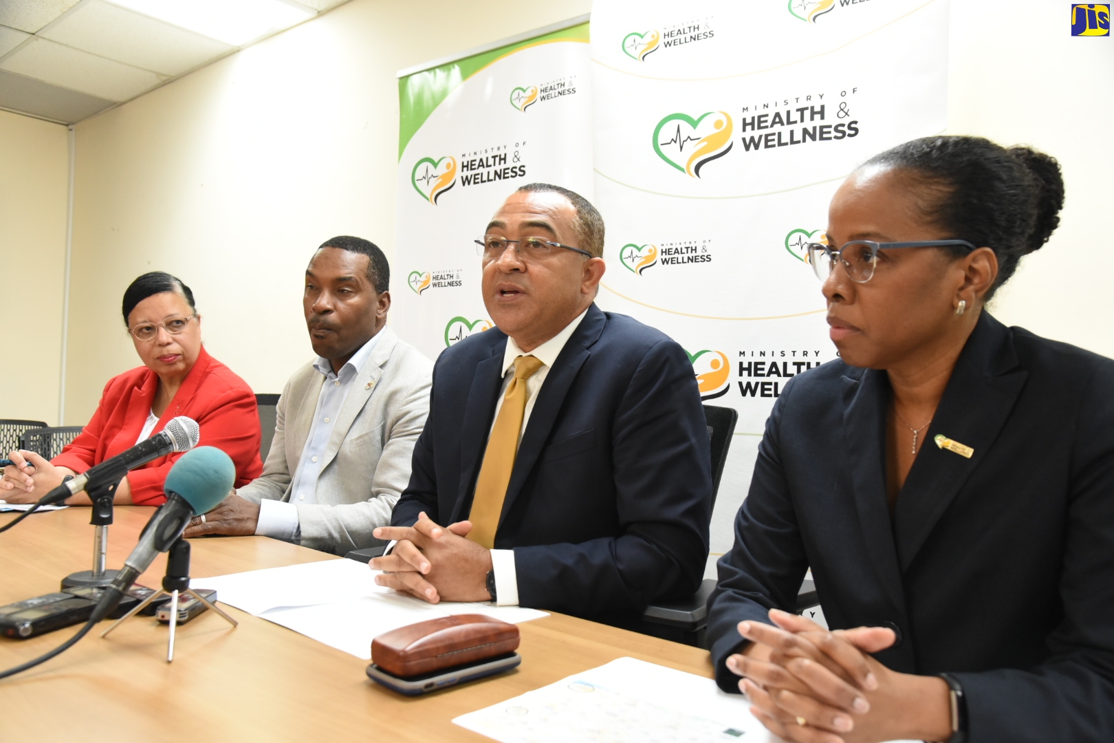 Minister of Health and Wellness, Dr. the Hon. Christopher Tufton (second right), speaks at Tuesday’s (January 28) media briefing at the Ministry’s offices in New Kingston. Listening (from left) are Pan-American Health Organization/World Health Organization (PAHO/WHO) Jamaica Country Representative, Dr. Bernadette Theodore-Gandi; Chief of Medical Staff, University Hospital of the West Indies, Dr. Carl Bruce; and Acting Chief Medical Officer, Dr. Karen Webster Kerr.
