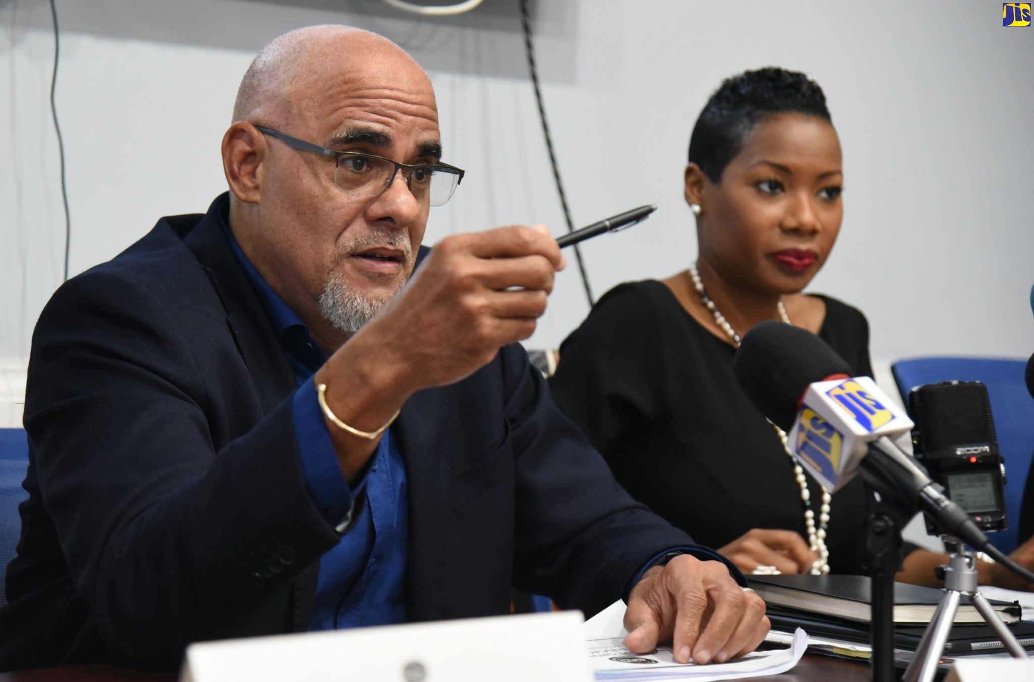 Private Sector Organisation of Jamaica (PSOJ) President, Keith Duncan, addresses journalists during the launch of the PSOJ’s 2020-2022 Strategy, at the entity's offices in Kingston, recently. At right is Chief Executive Officer, Makeba Bennett-Easy.