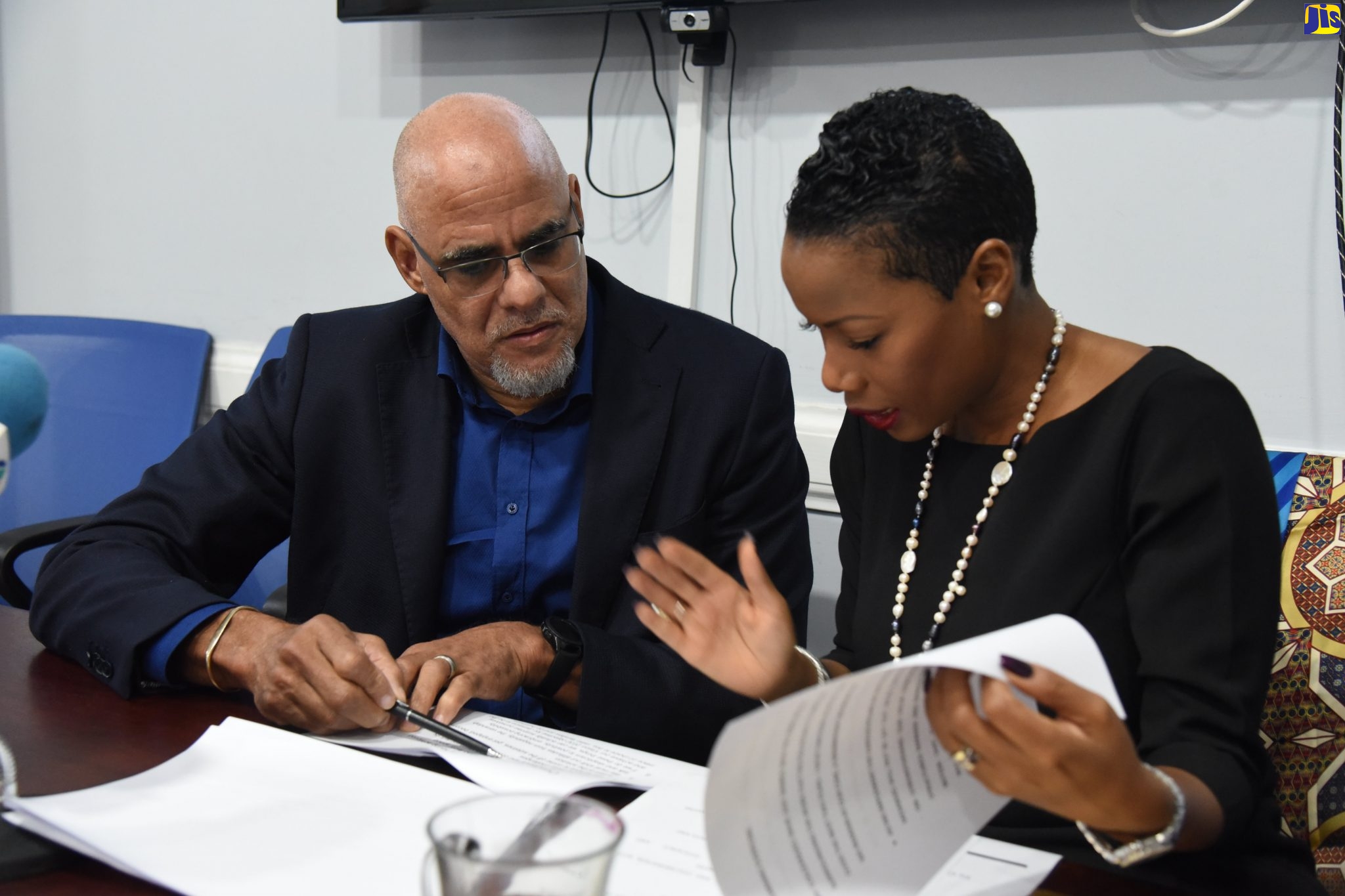 Private Sector Organisation of Jamaica (PSOJ) President, Keith Duncan (left), consults with Chief Executive Officer, Makeba Bennett-Easy, during Thursday’s (January 9) launch of the PSOJ’s 2020-2022 Strategy. The event was held at the entity’s head office in New Kingston.