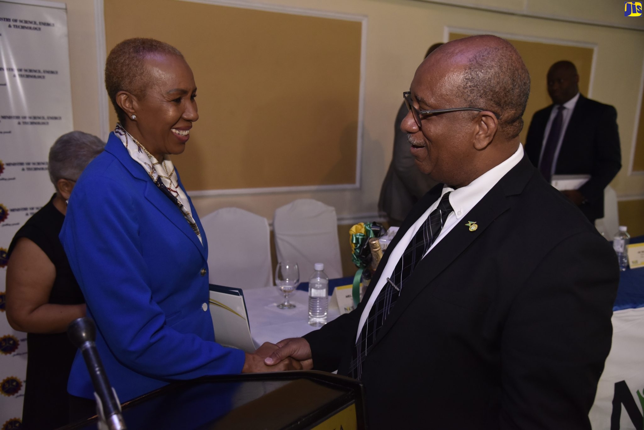 Minister of Science, Energy and Technology, Hon. Fayval Williams, is greeted by Chief Executive Officer, Passport Immigration and Citizenship Agency (PICA), Andrew Wynter, on Wednesday (January 15), at the Terra Nova All-Suite Hotel in Kingston, at the launch of the new National Public Key Infrastructure (PKI) project.