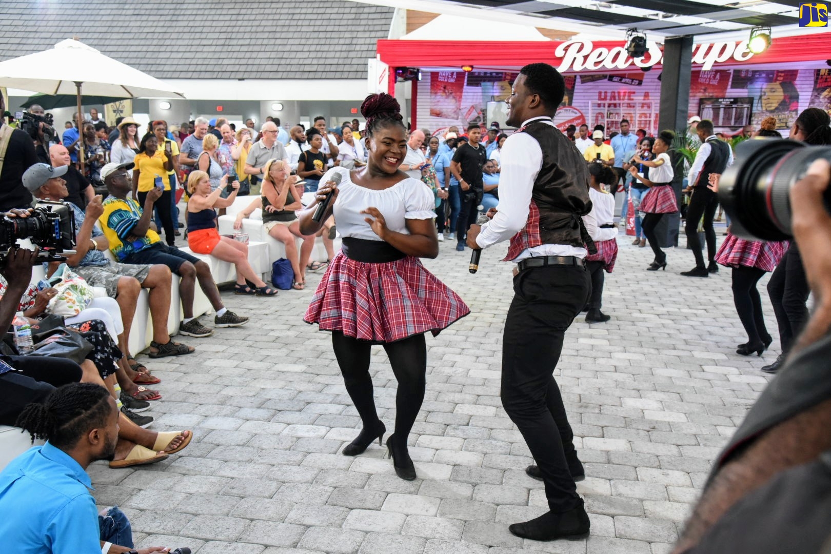 Dancers, Ackeria Smith and Marlon Tomlinson, perform at a party for tourists at the new port facility in Port Royal on Monday (January 20).