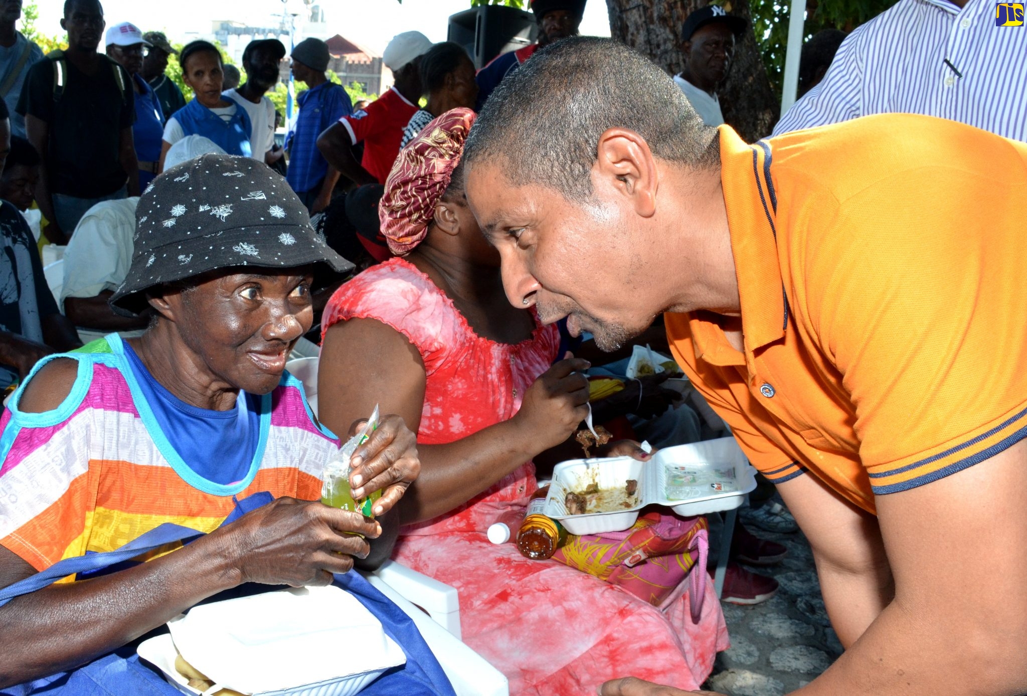 His Worship the Mayor of Kingston, Senator Councillor Delroy Williams (right) shares in conversation with Beverly Turner, at the Mayor’s annual feeding of the homeless event at the St. William Grant Park, Downtown Kingston, today (January 1). The event was held as part of ongoing efforts to provide support and responsible care for the poorest and less fortunate, in the community by the Kingston and St. Andrew Municipal Corporation.