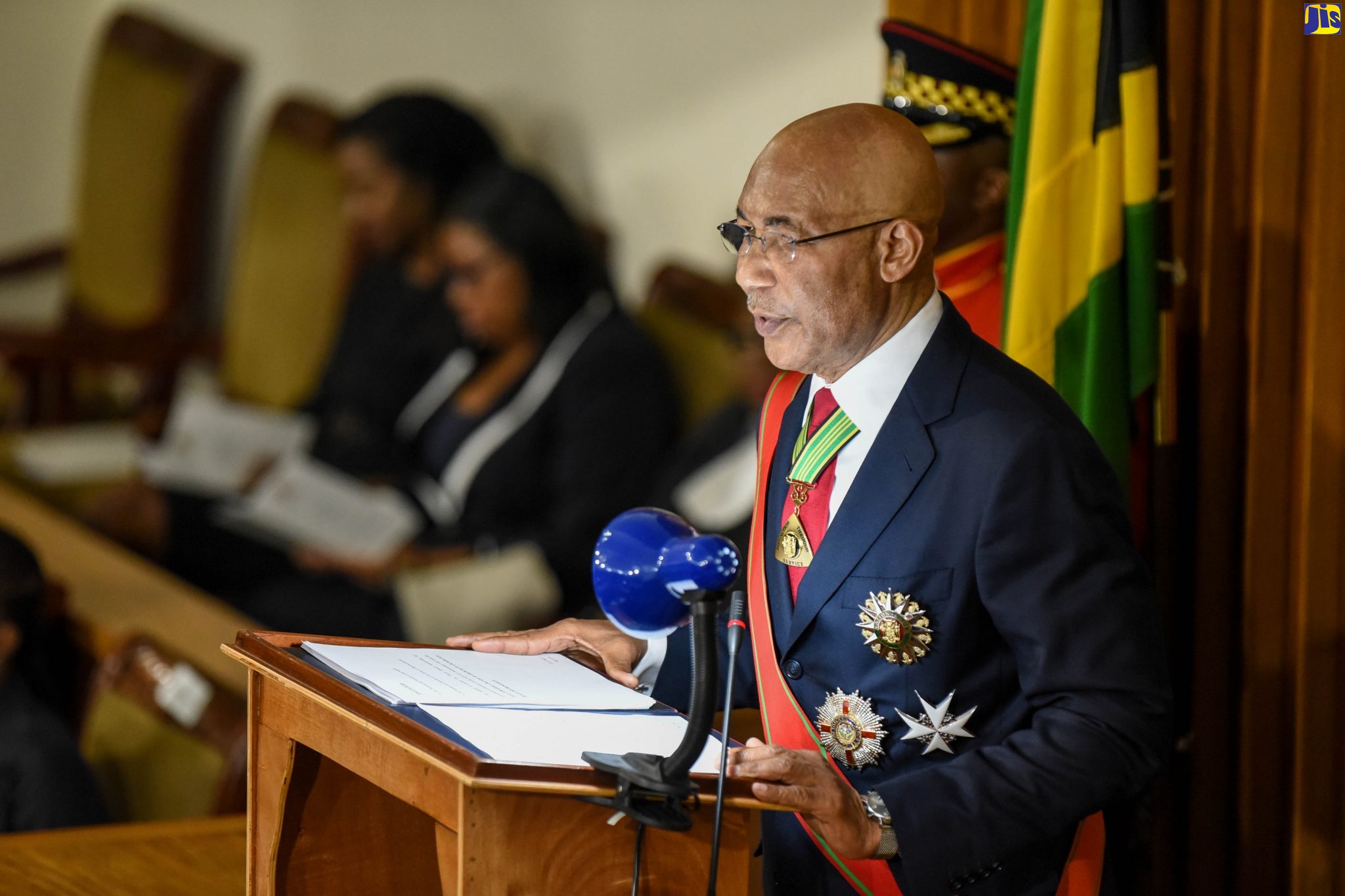 Governor-General, His Excellency the Most Hon. Sir Patrick Allen (right), delivers the 2020/21 Throne Speech, under the theme ‘Towards a Decade of Growth to Anchor Our Peace and Prosperity‘, at the Ceremonial Opening of Parliament on February 11.