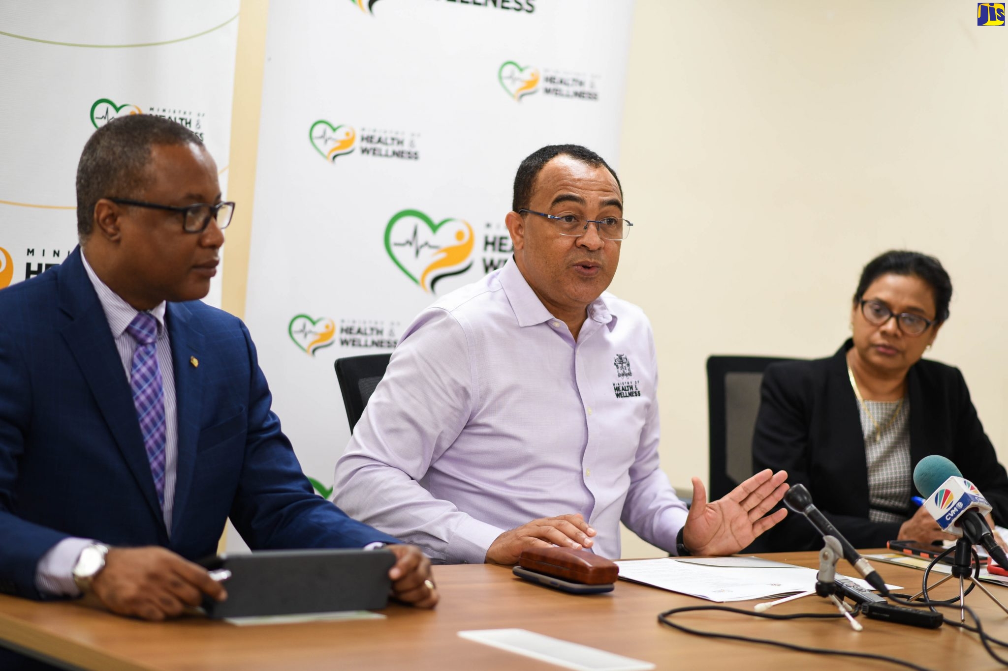 Minister of Health and Wellness, Dr. the Hon. Christopher Tufton (centre), addressing journalists during a media briefing at the Ministry’s New Kingston offices on Wednesday (February 5), where he provided an update on Jamaica’s national emergency response and preparedness for the coronavirus. Listening (from left) are Permanent Secretary in the Ministry, Dunstan Bryan; and Chief Medical Officer, Dr. Jacquiline Bisasor-McKenzie.
