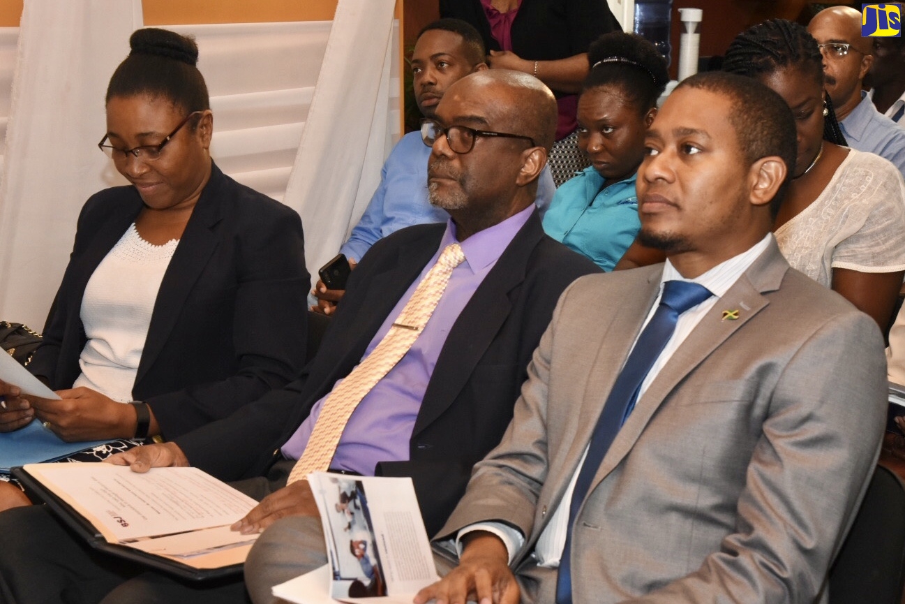 State Minister in the Ministry of Industry, Commerce, Agriculture and Fisheries,  Hon. Floyd Green (right);  Executive Director, Bureau of Standards Jamaica (BSJ), Hopeton Heron (centre) and Chartered Quality Professional Trainer, Dr. Yvette Castell, at the launch of the JS ISO 31000: 2019 Risk Management Guidelines, on Tuesday (February 25) at the offices of the BSJ, in Kingston.