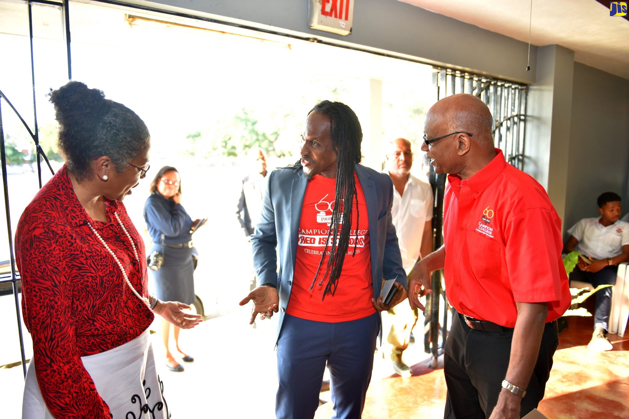 Minister of State in the Ministry of Education, Youth and Information,  Hon. Alando Terrelonge (centre), speaks with Principal, Campion College, Grace Baston (left), at the school’s Magis Awards Ceremony, held on Thursday (January 30) at the school. Mr. Terrelonge delivered greetings at the event.    At right is Chairman, Campion College Board of Management, Anton Thompson.
