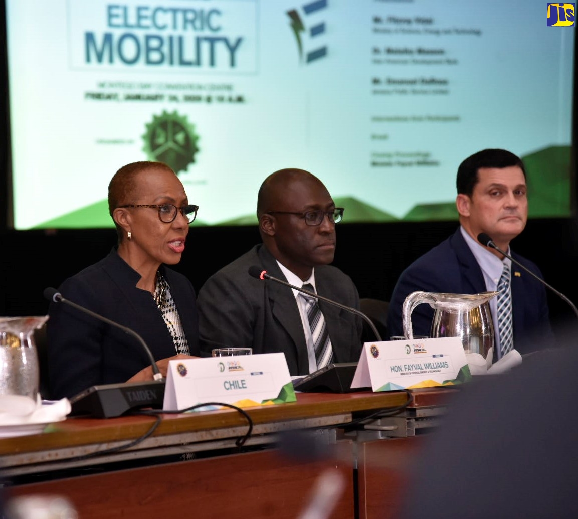 Minister of Science, Energy and Technology, Hon. Fayval Williams (left) speaking at a recent Energy Round Table hosted by the Ministry in Montego Bay, St. James.  Listening are Principal Director in the Ministry, Fitzroy Vidal (centre); and President and Chief Executive Officer (CEO) of the Jamaica Public Service Company (JPS), Emanuel DaRosa.