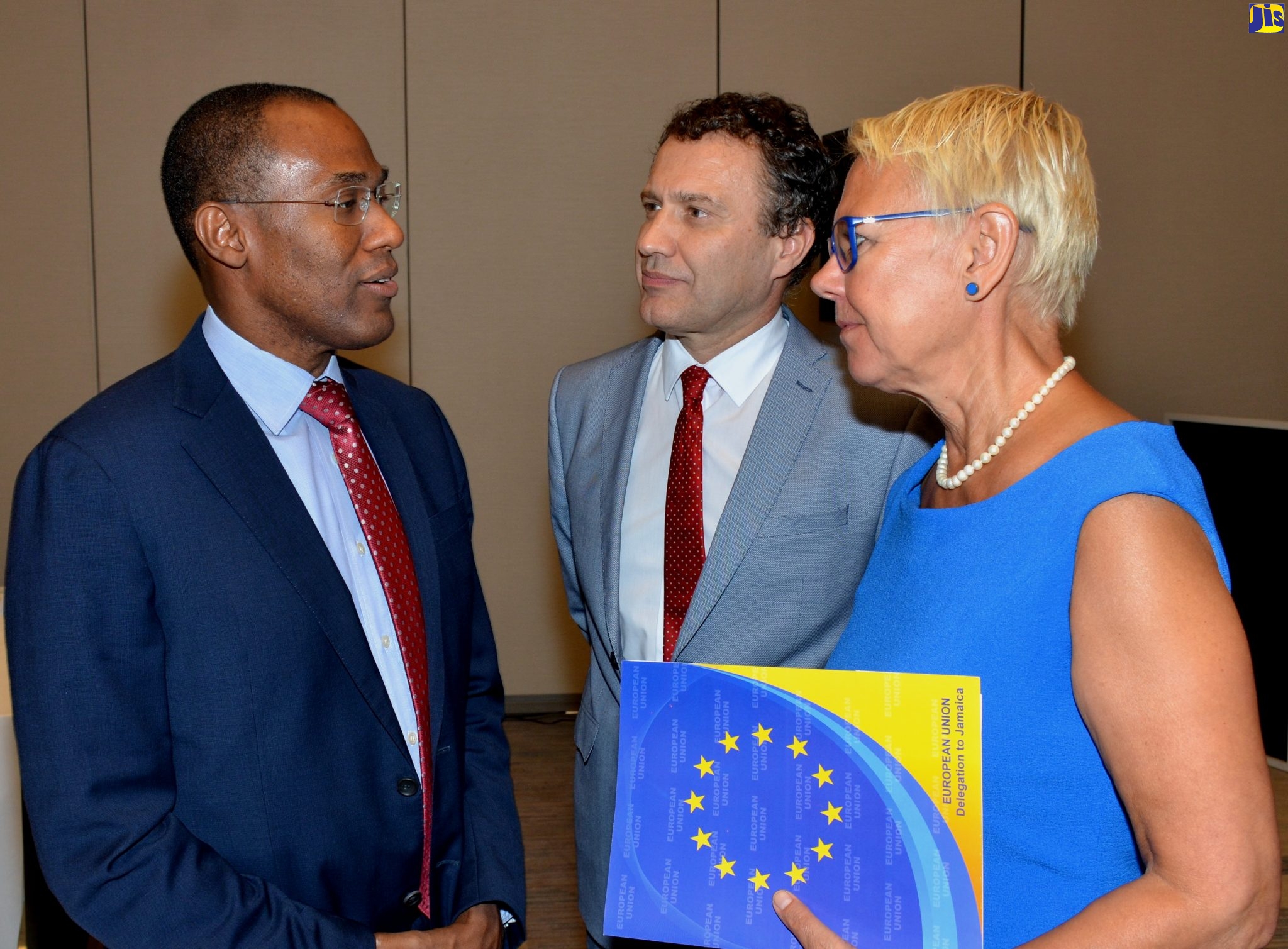 Minister of Finance and the Public Service, Dr. the Hon. Nigel Clarke (left), converses with European Investment Bank (EIB) Caribbean Regional Representative, Yves Ferreira (centre); and Head of the Delegation of the European Union to Jamaica, Belize, Turks and Caicos Islands, The Bahamas, and the Cayman Islands, Ambassador Malgorzata Wasilewska, during the opening ceremony for the EIB’s two-day 2020 Caribbean Roadshow symposium, at the AC Marrott Hotel in Kingston, on Wednesday (February 12).
