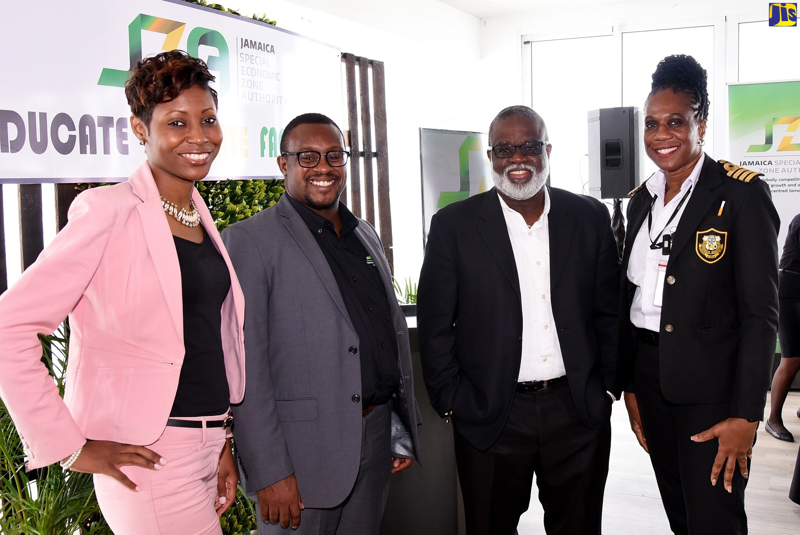 Chief Executive Officer (CEO) of the Jamaica Special Economic Zones Authority (JSEZA), Dr. Eric Deans (third left), with (from left) JSEZA Senior Legal Officer and Corporate Secretary, Chantal Bennett; Director, Regulations, Policy, Enforcement and Monitoring, JSEZA, Ainsley Brown; and Operations Manager, Jamaica Customs Agency Freezone, Bridgette Pinnock, following a sensitisation session hosted by the Authority, on February 21, at the S Hotel in Montego Bay, St. James.


