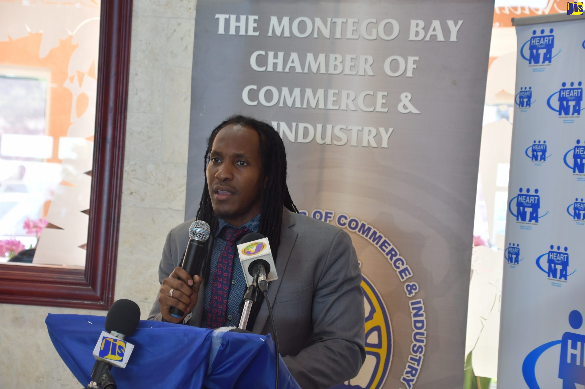 Minister of State in the Ministry of Education, Youth and Information, Hon. Alando Terrelonge,  addresses a joint business forum, sponsored by the Montego Bay Chamber of Commerce & Industry and the Business Process Industry Association of Jamaica (BPIAJ), at the Grand A View Events Place, Queen’s Drive, Montego Bay, on January 30.