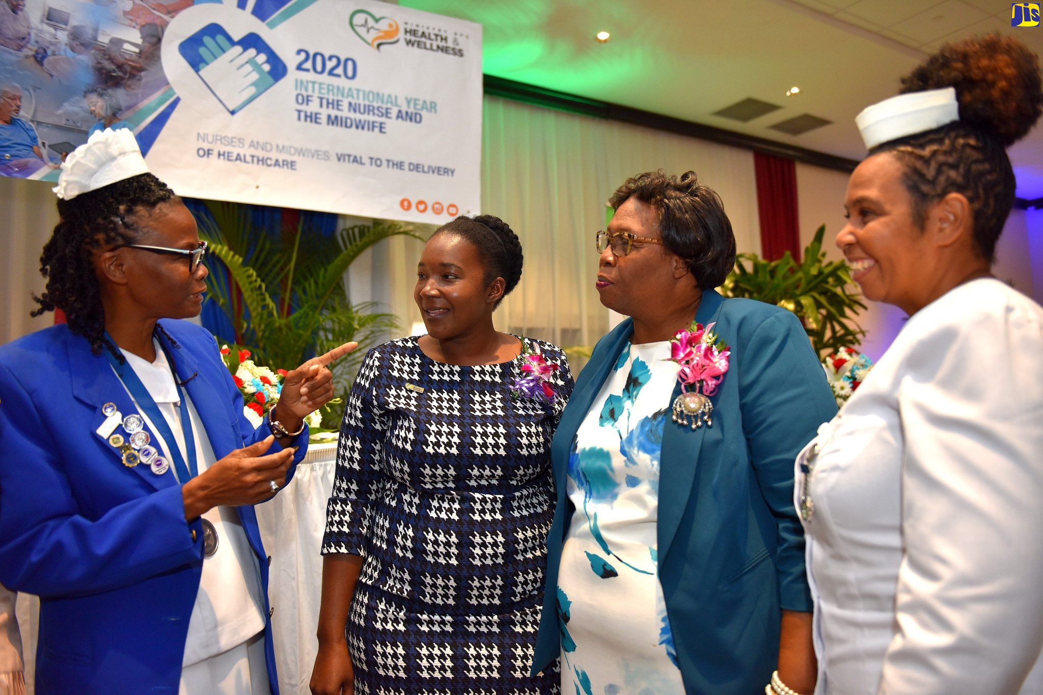 President of the Nurses Association of Jamaica, Carmen Johnson (left), has the attention of (from second left): Director of Policy Analysis and Research in the Ministry of Health and Wellness, Rowena Palmer; Chairman of the Nursing Council of Jamaica, Dr. Leila McWhinney-Dehaney and President of the Jamaica Enrolled Assistant Nurses of Jamaica, Josephine Hutchinson-Bedward, at the launch of the International Year of the Nurse and Midwife, on January 31, at the Jamaica Pegasus Hotel, in Kingston.
