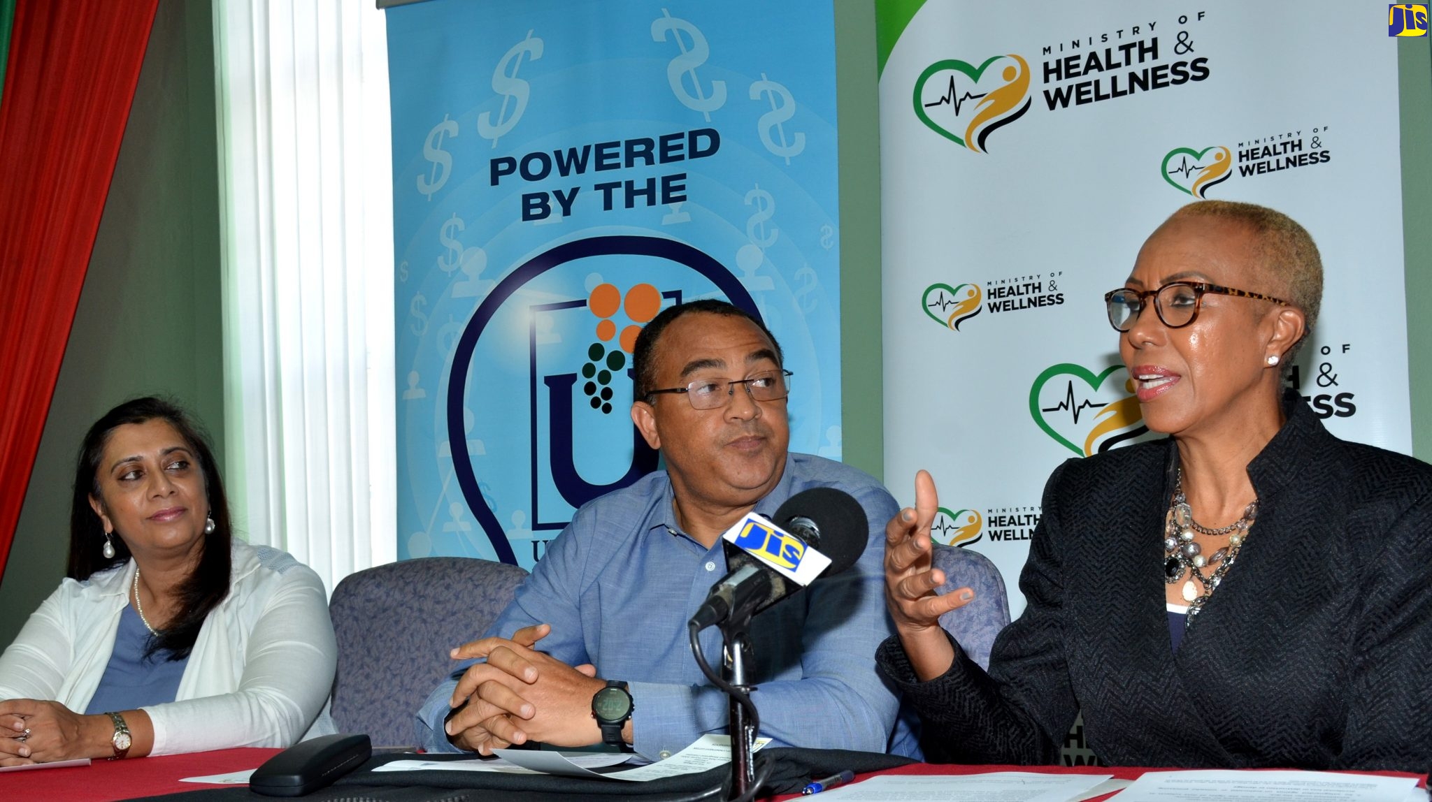 Science, Energy and Technology Minister, Hon. Fayval Williams (right) speaking at a ceremony to announce an increase in bandwidth at the South East Regional Health Authority (SERHA) and the Kingston Public and Victoria Jubilee Hospitals, on Tuesday (February 18) at the hospitals’ North Street address in Kingston. Looking on (from left) are Chair, Universal Service Fund (USF) Board of Management, Dr. Gunjan Mansingh; and Health and Wellness Minister, Dr. the Hon. Christopher Tufton.