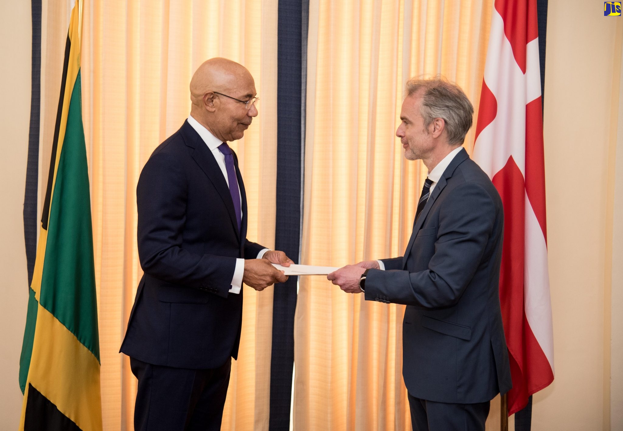 Governor-General, His Excellency the Most Hon. Sir Patrick Allen (left), receives Letters of Credence from Ambassador-designate of the Kingdom of Denmark, Lars Steen Nielsen, at King’s House, on March 2.