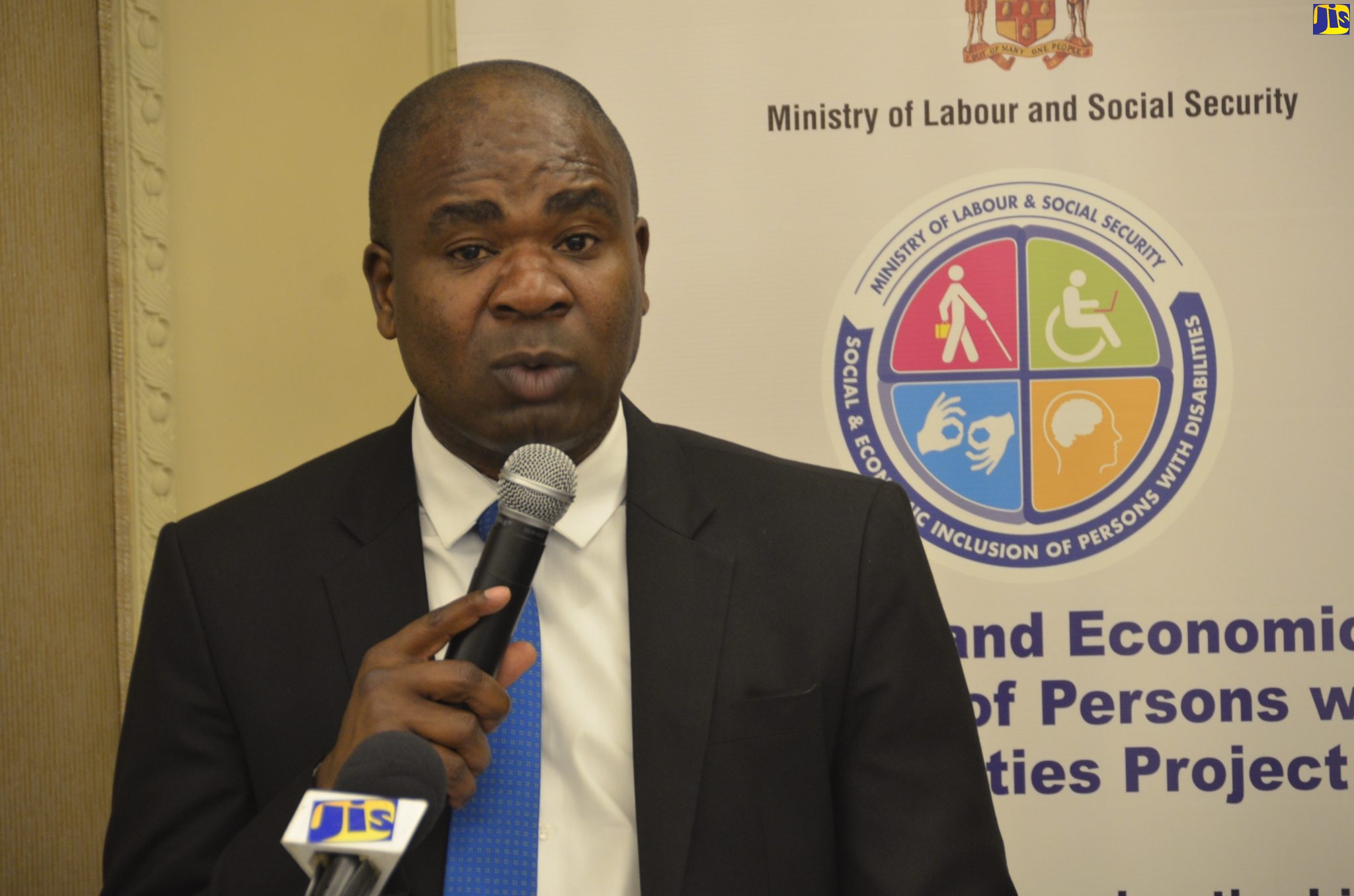 Minister of State for Labour and Social Security, Hon. Zavia Mayne.