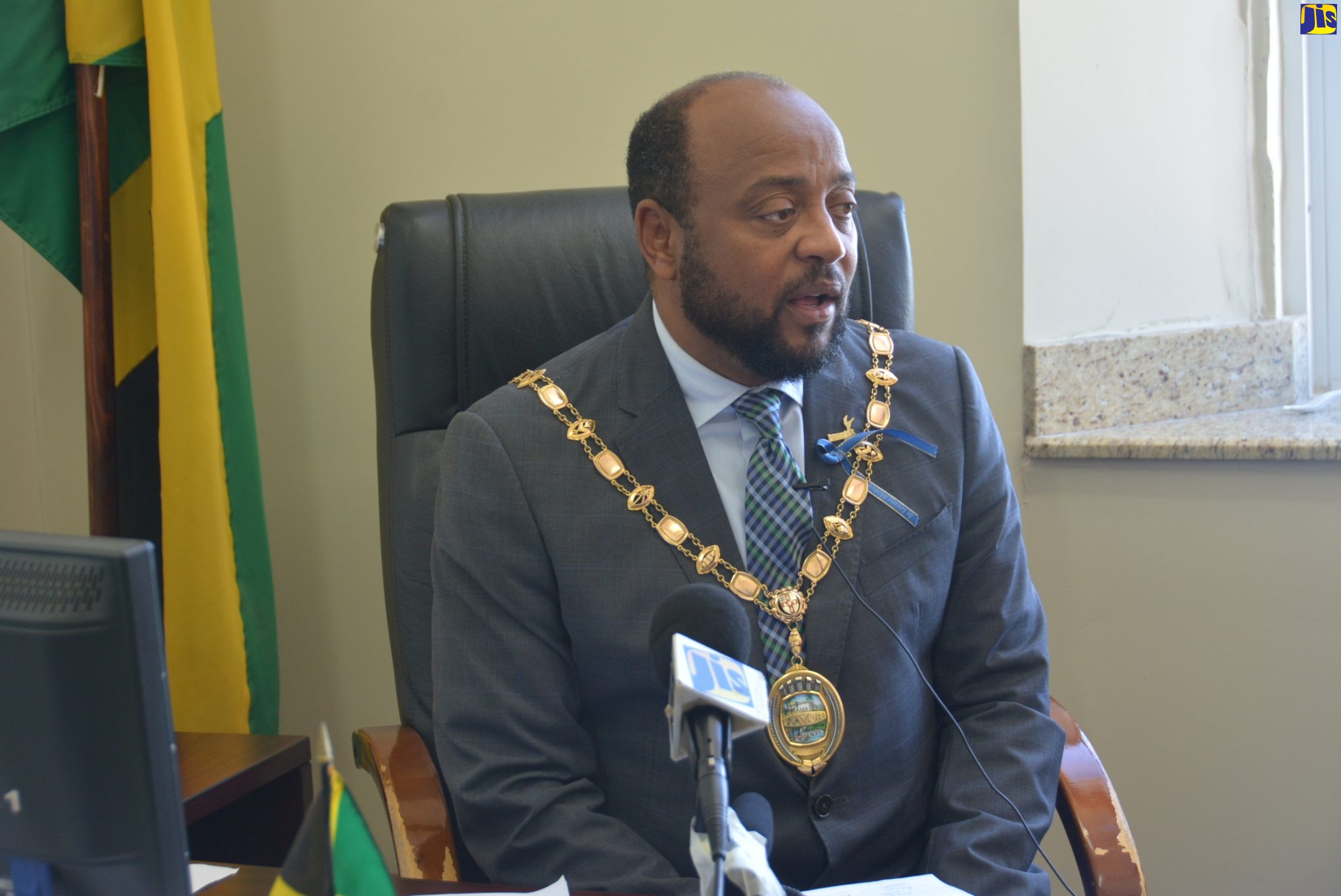 Mayor of St. Ann’s Bay, Councillor Michael Belnavis, addresses journalists at a press briefing, held in St. Ann’s Bay on March 12.