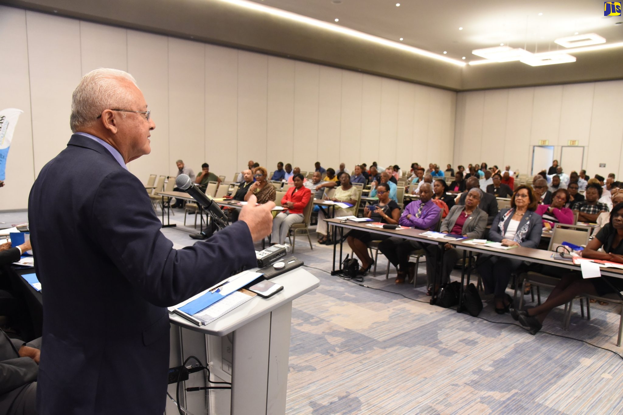 Justice Minister, Hon. Delroy Chuck, addressing Justices of the Peace (JPS) and police personnel at a sensitisation session organised by the Legal Aid Council (LAC) at the AC by Marriott Hotel in New Kingston on Tuesday (March 10).