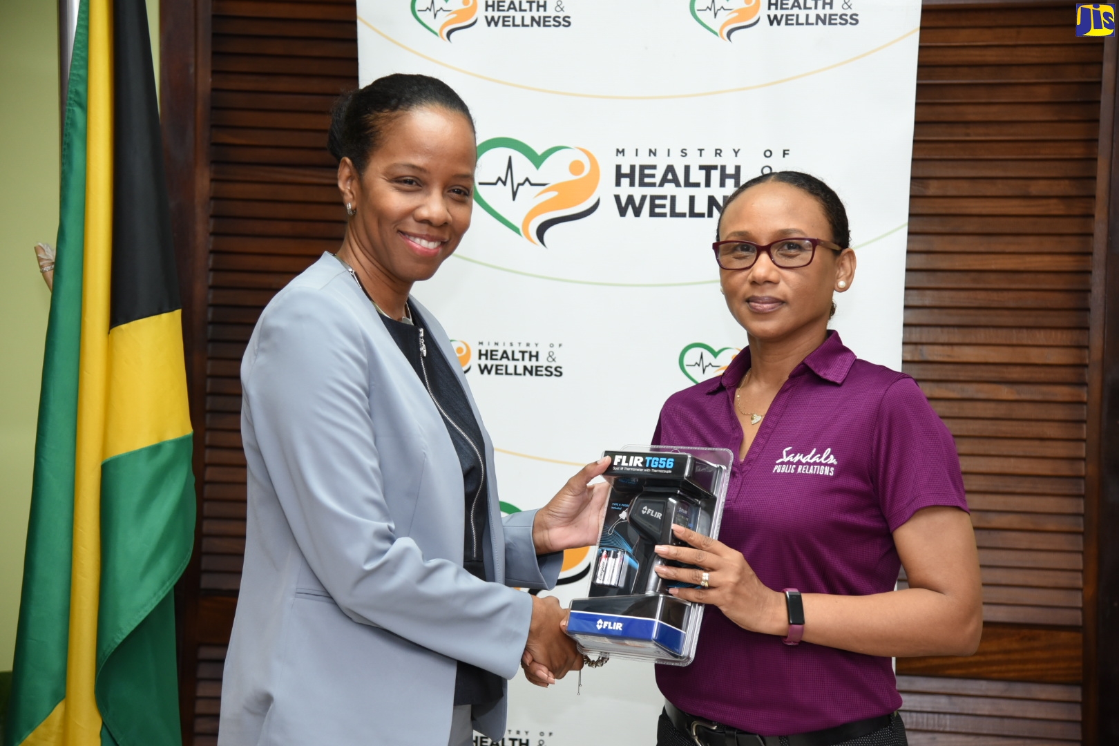 National Epidemiologist, Dr. Karen Webster Kerr (left), receives one of 10 thermal scanners donated to the Ministry of Health and Wellness by Sandals Resorts International, from Group Manager for Communications and Public Relations, Sheryl McGaw-Douse. The presentation was made during a handing over ceremony at the Ministry’s offices in New Kingston on Friday (March 6).