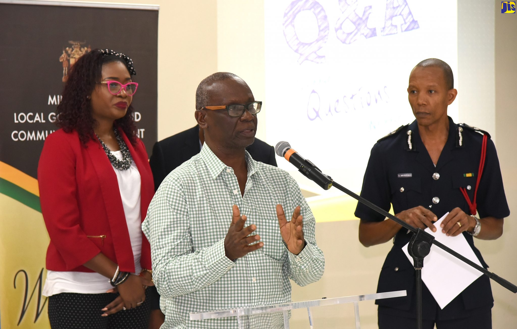 Local Government and Community Development Minister, Hon. Desmond McKenzie (second left), speaks at a special meeting to discuss the response of the Ministry, agencies and municipal corporations to the coronavirus (COVID-19), on March 13, at the Ministry in Kingston. With the Minister are Director of Health Promotion and Protection, Ministry of Health and Wellness, Dr. Simone Spence; and Commissioner of the Jamaica Fire Brigade (JFB), Stewart Beckford.
