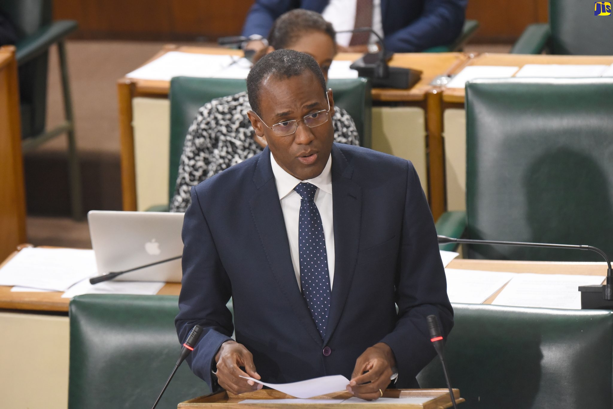 Minister of Finance and the Public Service, Dr. the Hon. Nigel Clarke, speaks in the House of Representatives on March 17.