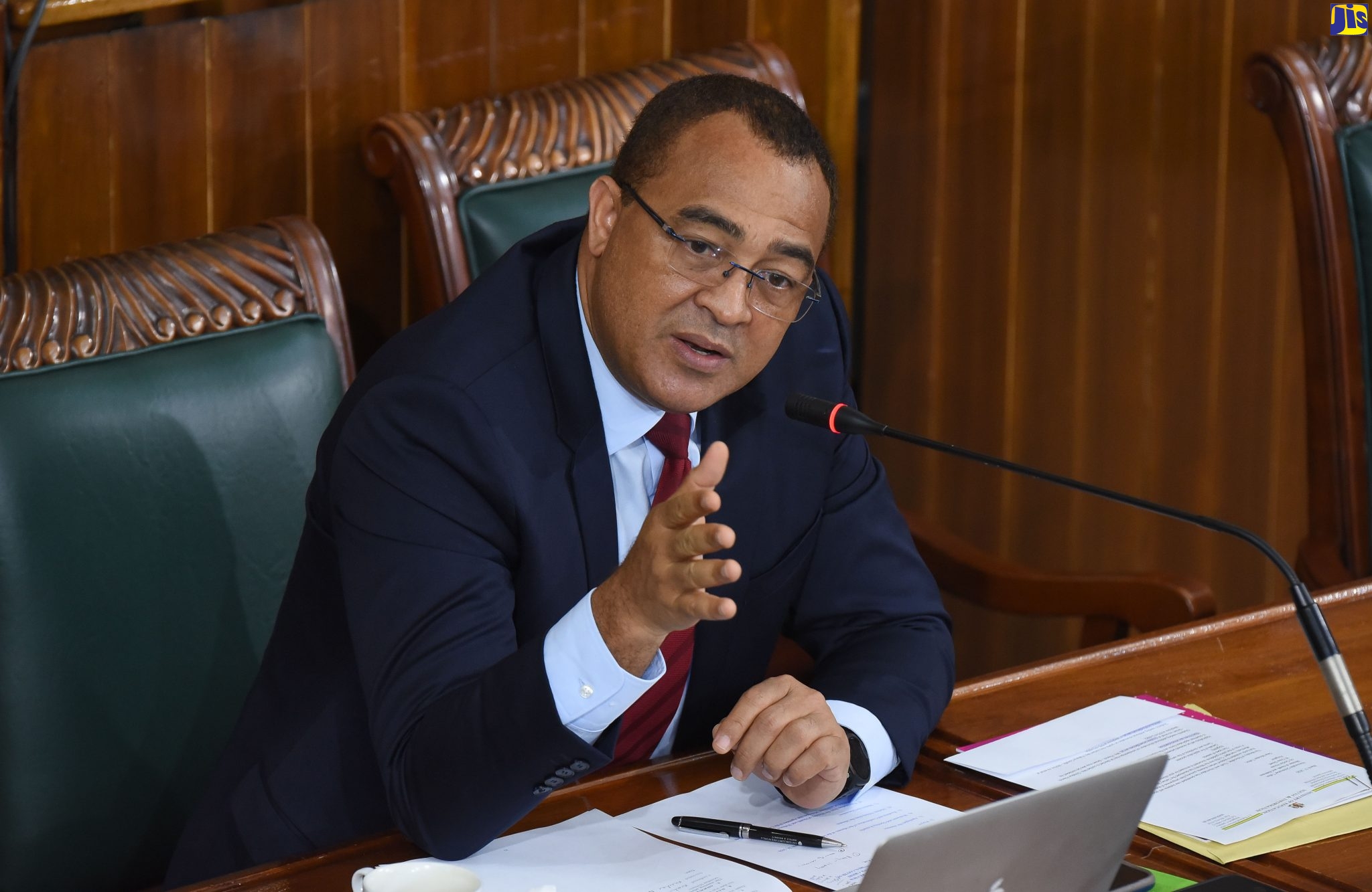 Minister of Health and Wellness, Dr. the Hon. Christopher Tufton, addresses a Special Select Committee meeting to review developments relating to COVID-19, in the House on April 2.