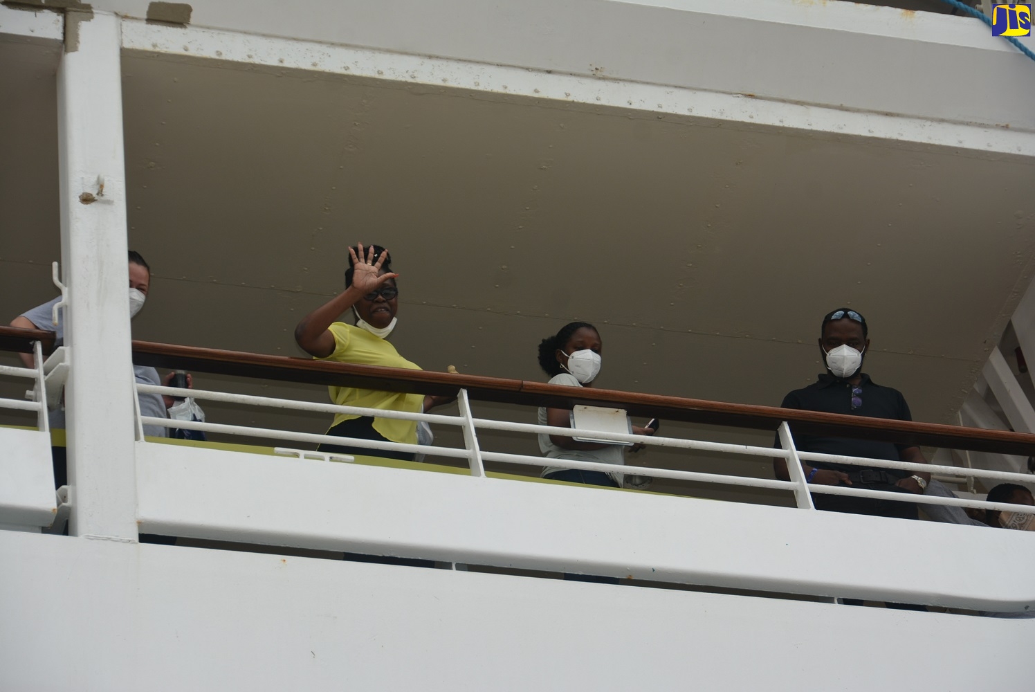 Jamaicans on board the Royal Caribbean’s Adventure of the Seas express their joy to be home following the disembarkation of the first batch of 200 Jamaican ship workers, at the Falmouth Pier in Trelawny on Thursday, May 21.