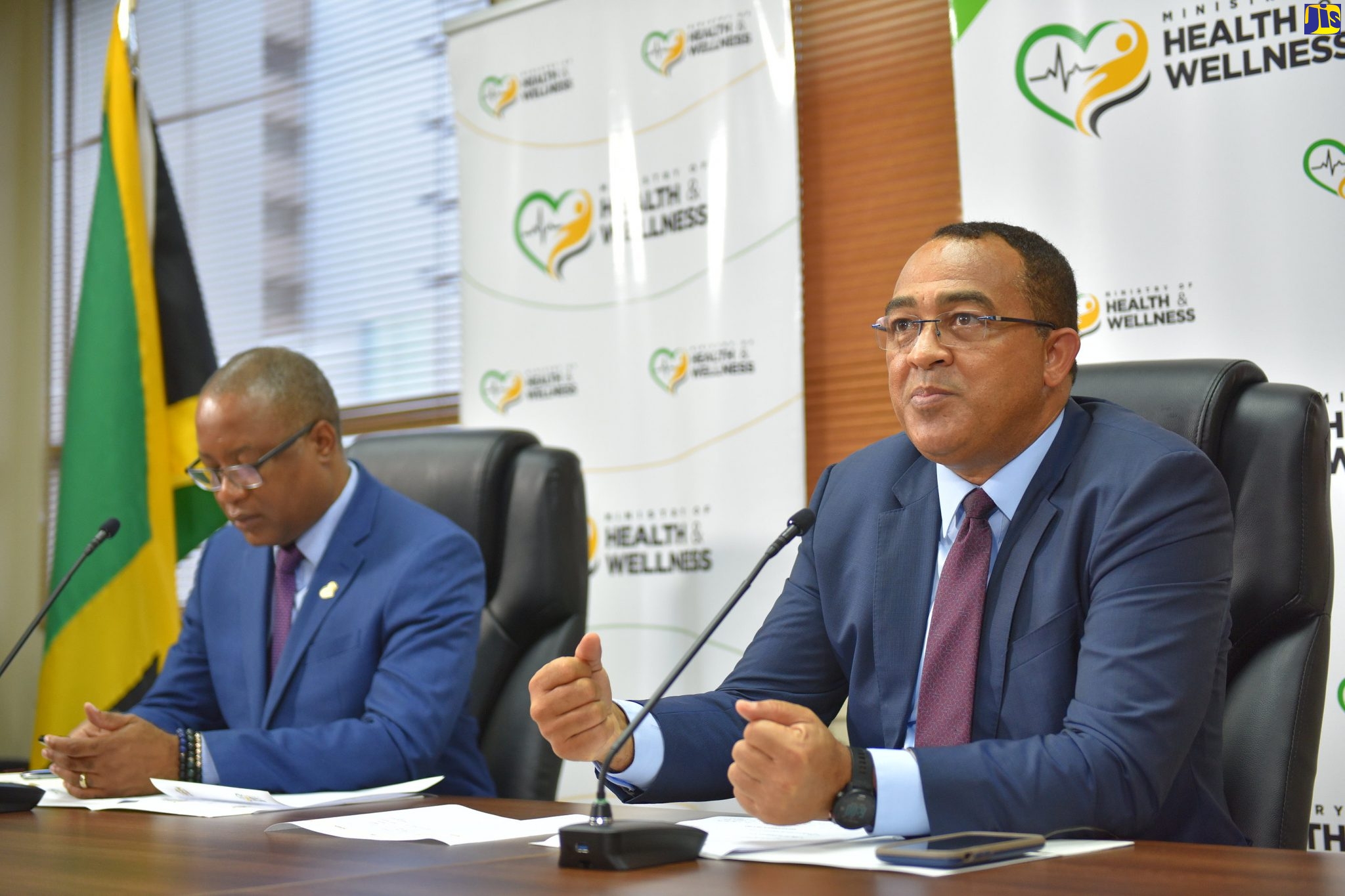 Minister of Health and Wellness, Dr. the Hon. Christopher Tufton, speaking at a digital press conference on Wednesday (May 13). At left is Permanent Secretary in the Ministry, Dunstan Bryan.