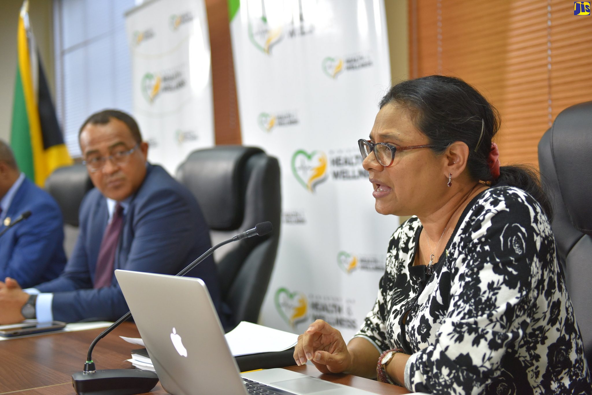 Chief Medical Officer, Ministry of Health and Wellness, Dr. Jacquiline Bisasor McKenzie (right), speaks at a digital press conference, in Kingston, on Wednesday (May 13). Seated beside her is Minister of Health and Wellness, Dr. the Hon. Christopher Tufton.