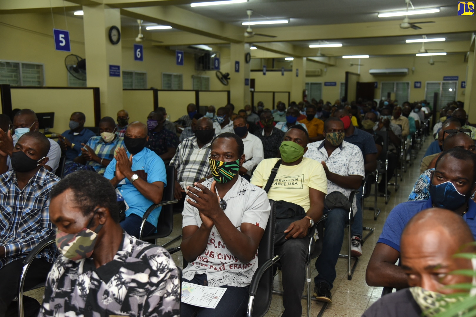 Some of the farmworkers who left the island today (June 12), for the United States.