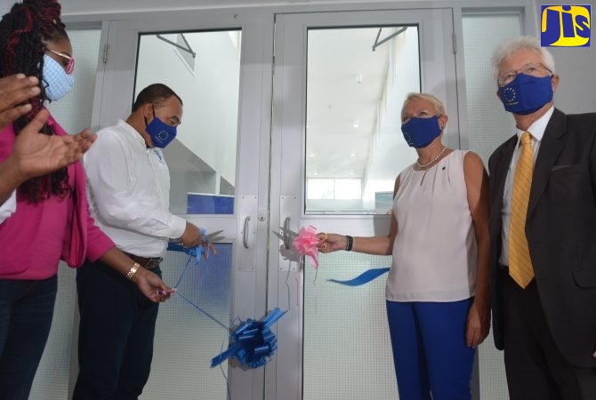 Minister of Health and Wellness, Dr. the Hon. Christopher Tufton (second left); and Head of the European Union (EU) Delegation to Jamaica, Ambassador Malgorzata Wasilewska (third left), cut the ribbon to open the $329-million Programme for the Reduction of Maternal and Child Mortality (PROMAC) High-Dependency Unit (HDU) building at the St. Ann