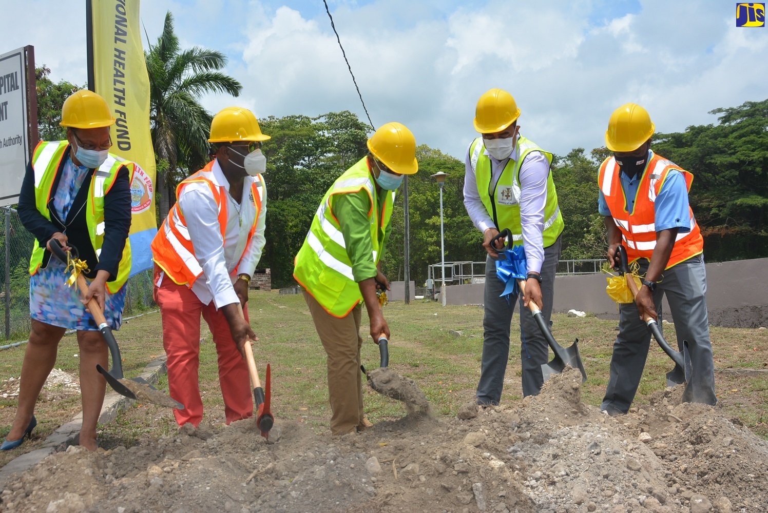 Minister of Health and Wellness, Dr. the Hon. Christopher Tufton (second right), breaks ground for the rehabilitation of the St. Ann’s Bay Hospital sewage treatment plant on Friday (June 19). He is joined by (from left) Director of the North Eastern Regional Health Authority (NERHA}, Fabia Lamm; CEO of Marshall Construction Company Ltd, Alphanso Reynolds; NERHA’s Chairman of the Board of Management, Tyrone Robinson; and Director of Projects, Institutional Benefits & Facilities Management at the National Health Fund, Orett Clarke.
