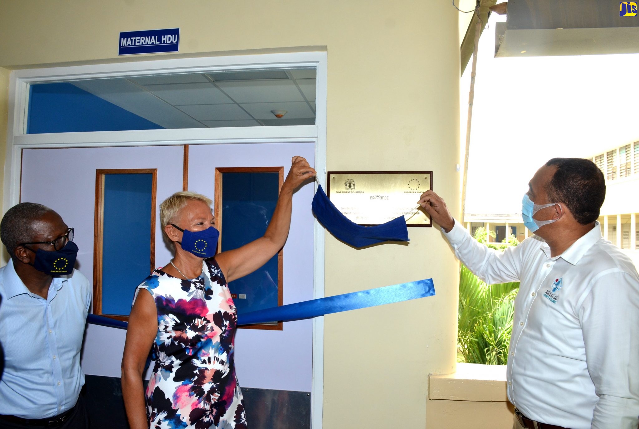 Minister of Health and Wellness, Dr. the Hon. Christopher Tufton (right); and Head of the Europen Union (EU) Delegation to Jamaica, Ambassador Malgorzata Wasilewska, unveil a plaque dedicating the High Dependency Unit (HDU), which opened at the Victoria Jubilee Hospital (VJH), downtown Kingston, on Wednesday (June 24). Looking on is Board Chairman, South East Regional Health Authority (SERHA), Wentworth Charles.