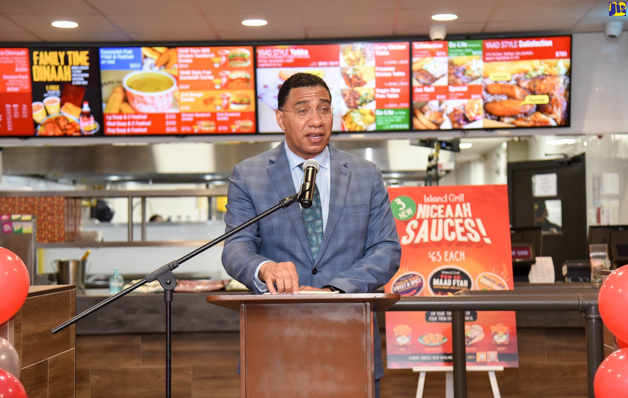 Prime Minister, the Most Hon. Andrew Holness, speaking at the official opening of Island Grill’s new restaurant on King Street in downtown Kingston on July 2.