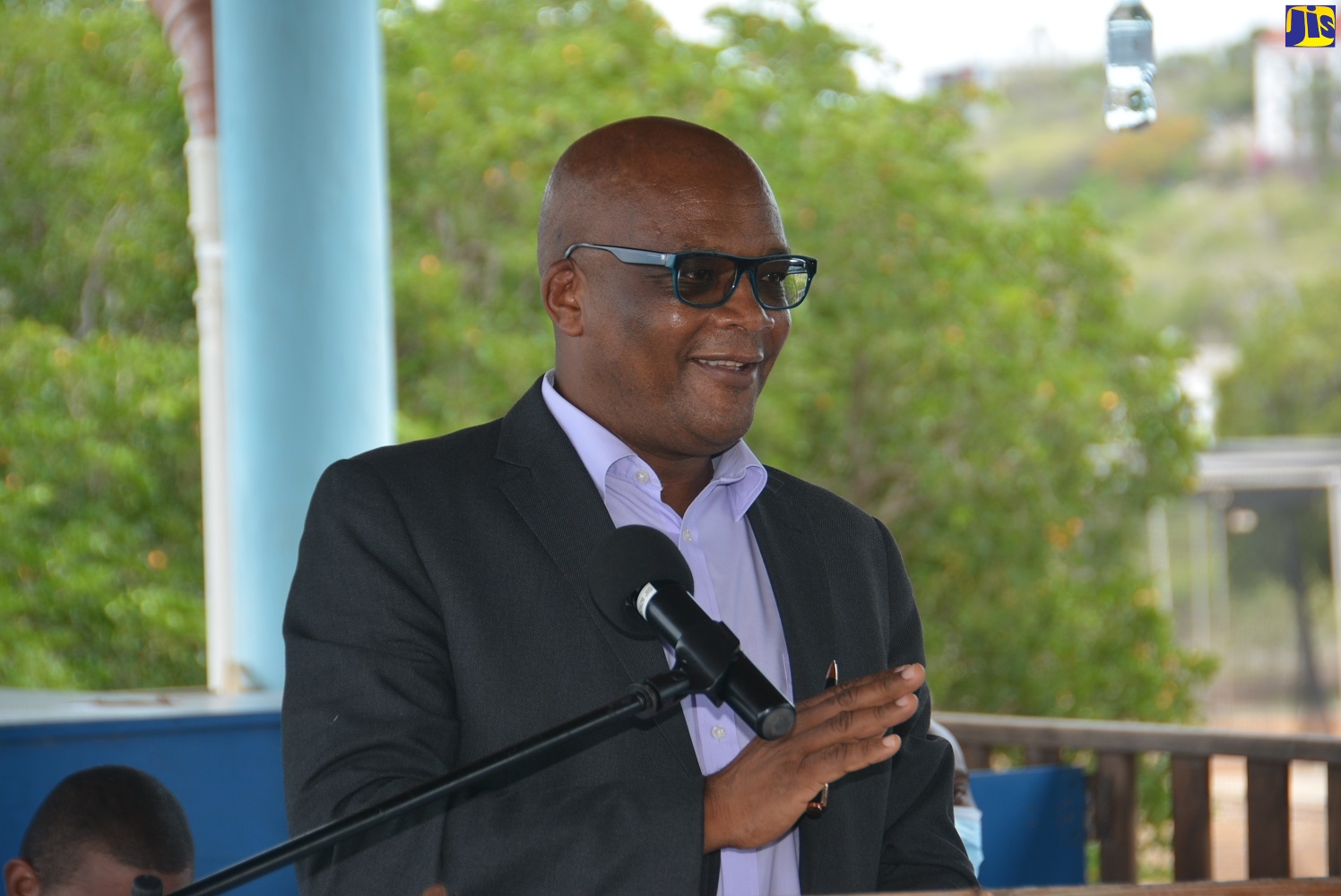Minister without Portfolio in the Ministry of Industry, Commerce, Agriculture and Fisheries (MICAF), Hon. Leslie Campbell, speaks at the launch of the ‘Promoting Community-Based Climate Resilience in the Fisheries Sector Project’, held at the Treasure Beach Sports Park in Treasure Beach, St. Elizabeth, on Friday, July 24.