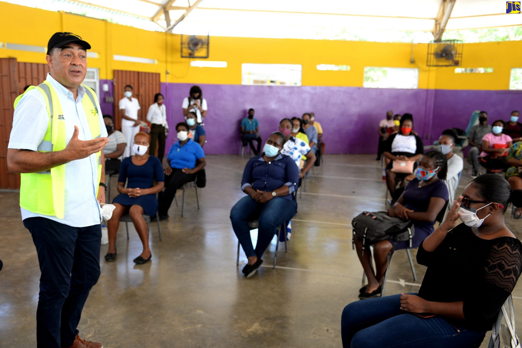 Health and Wellness Minister, Dr. the Hon. Christopher Tufton, addresses a Community Health Aide (CHA)  training session held on Wednesday (July 1), at Ascot High School in Portmore, St. Catherine.

