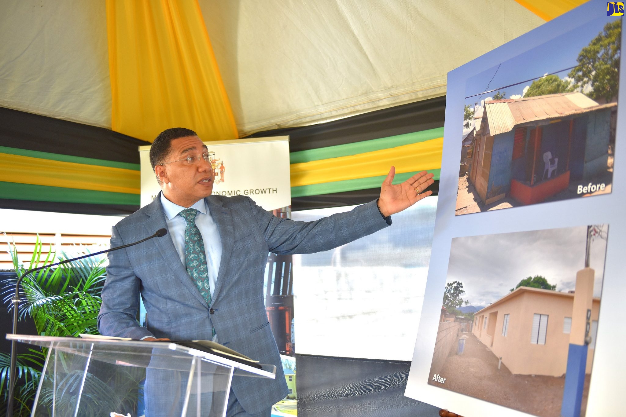 Prime Minister, the Most Hon. Andrew Holness, speaks at the handover ceremony for a three two-bedroom housing solution to three sisters in Annotto Bay, St. Mary, on Thursday (July 2).
