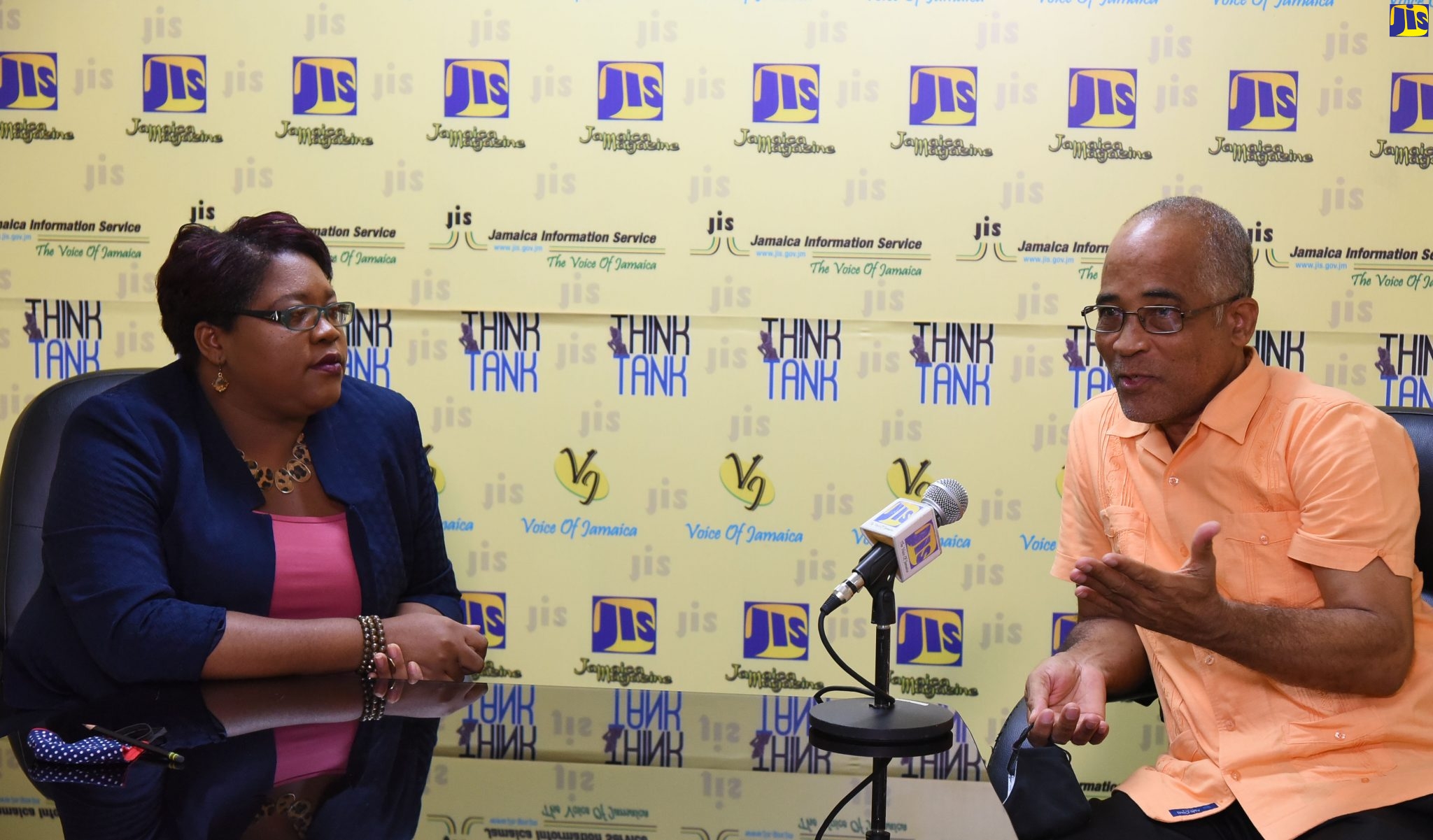 Programme Manager of the Citizen Security and Justice Programme (CSJP) III, Orville Simmonds (right), speaks at a recent JIS ‘Think Tank’. With  Mr. Simmonds is Acting Chief Technical Director,  Ministry of National Security, Shauna Trowers.

