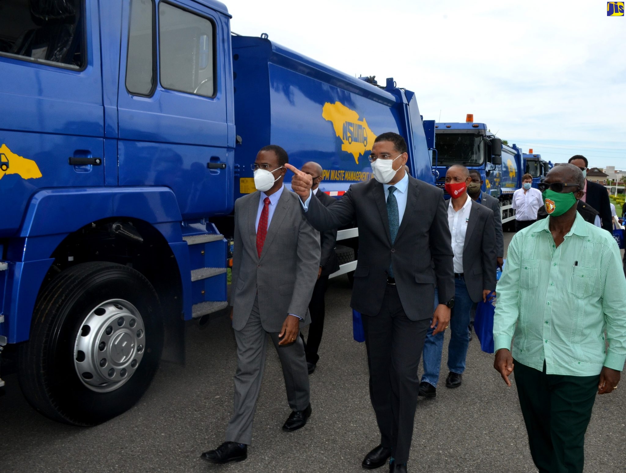 PM Hands Over 20 New Garbage Trucks To NSWMA
