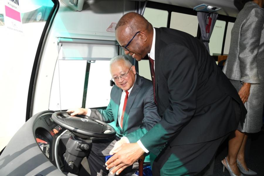Executive Director of the Legal Aid Council (LAC), Hugh Faulkner (right) and Justice Minister, Hon. Delroy Chuck,  inside a  mobile justice unit.

 