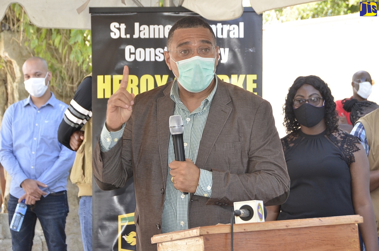 Prime Minister the Most Hon. Andrew Holness, addresses residents at a ceremony to commission into service the Flower Hill Water Supply System in St. James on Friday, August 7.