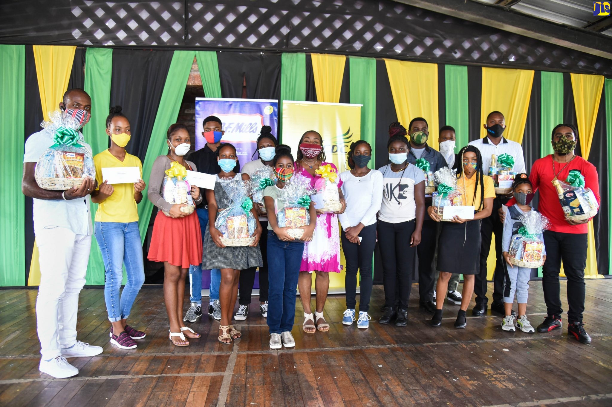 Members of the winning teams for the various categories in the Jamaica Cultural Development Commission (JCDC) ‘Perform A Yaad’ Social Media Competition, along with their respective teachers pose for a photograph after collecting their prizes at an awards presentation ceremony for the competition, held at the Louise Bennett Garden Theatre at the Ranny Williams Entertainment Centre in St. Andrew, on Tuesday (August 4).  
 
The group-based competition, which ran on the JCDC’s Facebook and Instagram pages, saw participating groups submitting a video recording of their best at-home performance. It targeted previous participants of the JCDC’s National Festival of the Performing Arts, covering the five performing arts subject areas of:Dance, Drama, Music, Speech and Traditional Folk Forms, and was hosted in an effort to keep JCDC performing arts junior participants engaged during the stay-at-home orders stipulated by the Government as part of measures to contain the local spread of the coronavirus (COVID-19).