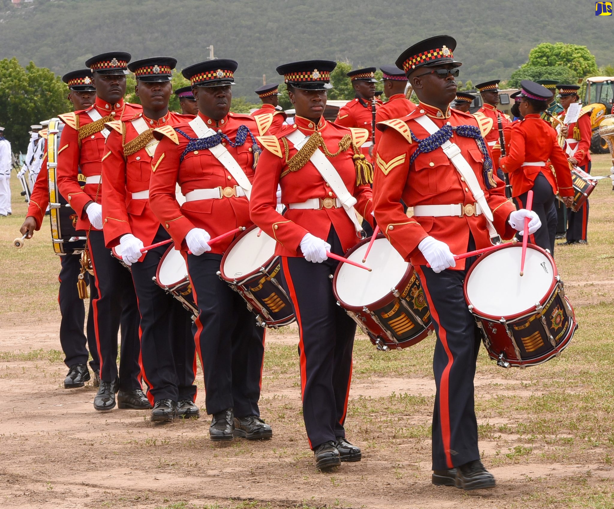 Members of the Jamaica Defence Force (JDF) Mass Bands and the Corps of Drums of the Jamaica Regiment perform during the JDF’s Armed Forces Day Parade at Up Park Camp in Kingston, on Friday (July 31).