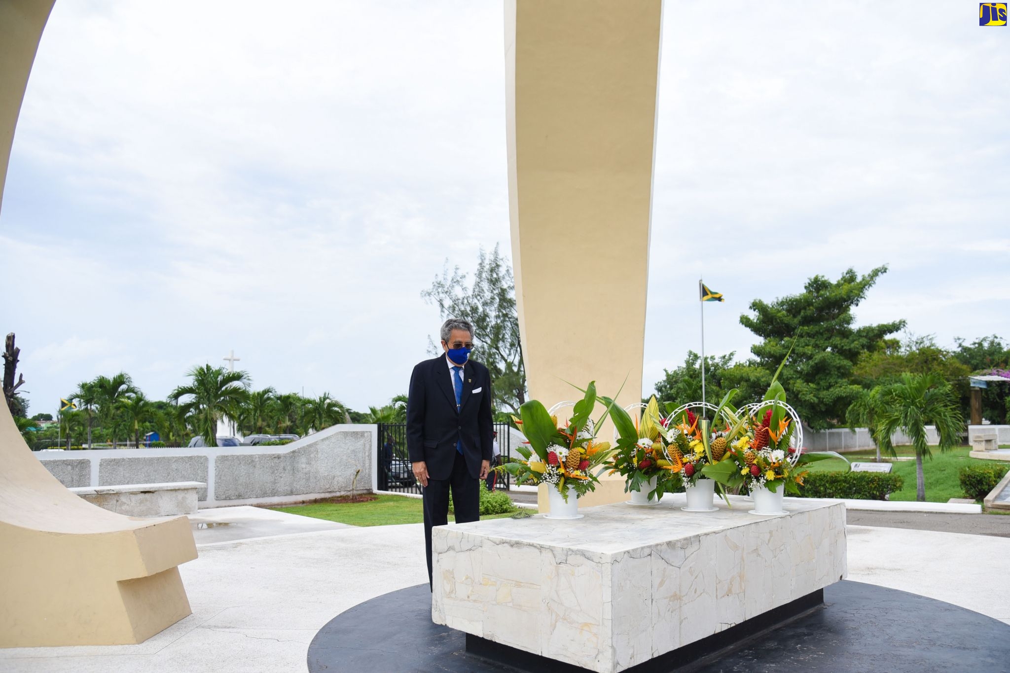 Bindley Sangster looks at the shrine of his father, the late former Prime Minister, Sir Donald Sangster, after laying a wreath on October 26 to mark the 109th anniversary of Sir Donald’s birth.