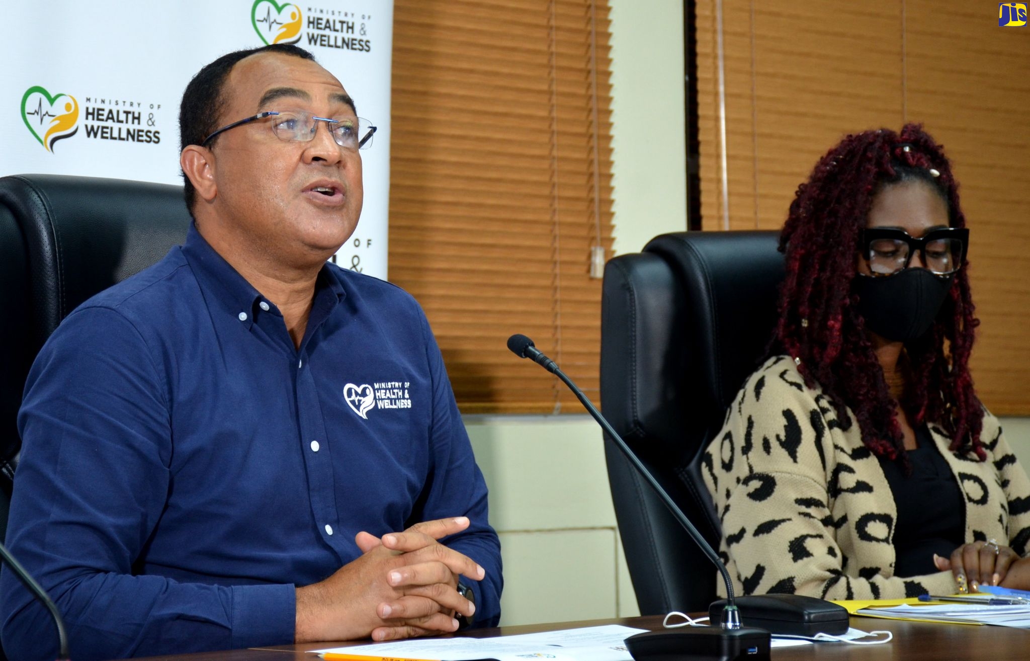 Minister of Health and Wellness, Dr. the Hon. Christopher Tufton (left), speaking during the Ministry’s weekly COVID Conversations digital press conference on Thursday (October 15). Beside him is the Acting Chief Medical Officer, Dr. Simone Spence.