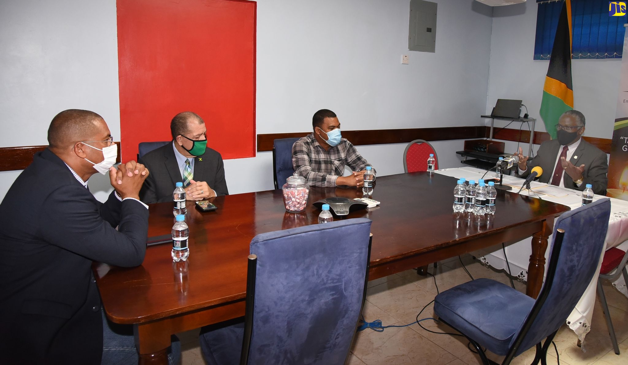 Custos of Manchester, Garfield Green (right), addresses a recent meeting with Members of Parliament (MP) in the parish held at his office in Williamsfield. From left are MP for North West Manchester, Mikhail Phillips; MP for North East Manchester, Hon. Audley Shaw; and MP for South Manchester, Robert Chin. MP for Central Manchester, Rhoda Crawford, was absent.