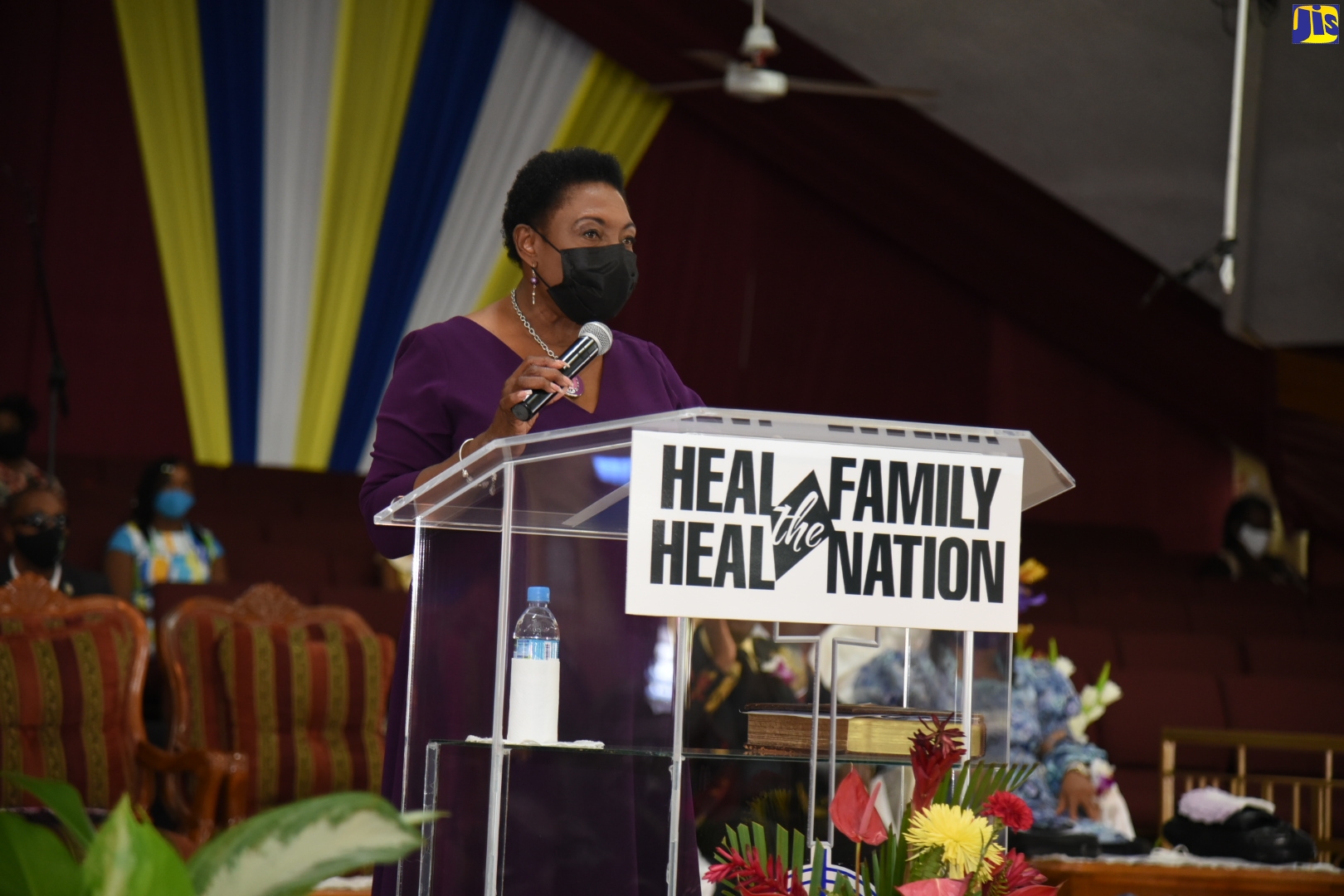 Minister of Culture, Gender, Entertainment and Sport, Hon. Olivia Grange, speaks at a church service held on Sunday, (November 22) at the Power of Faith Ministries in Portmore, St Catherine, to mark International Day for the Elimination of Violence Against Women (IDEVAW).