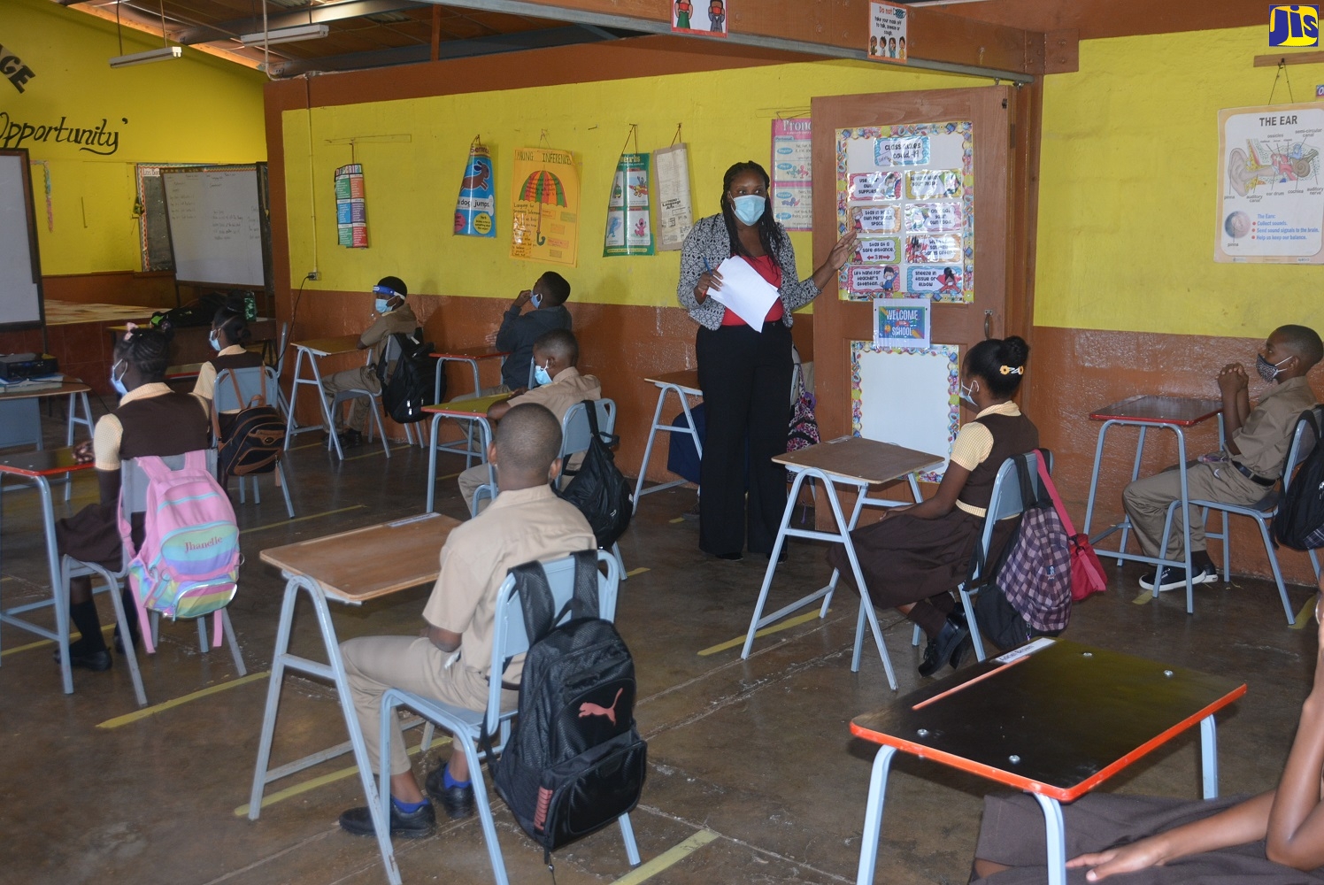 Grade-six teacher at Bethlehem Primary and Infant School in Malvern, St. Elizabeth, Marcine Parkinson-Pike, outlines the coronavirus (COVID-19) safety protocols to students following the resumption of face-to-face classes at the institution on Tuesday (November 10). The school is one of 17 primary and secondary institutions across the island participating in the Government’s two-week pilot programme.