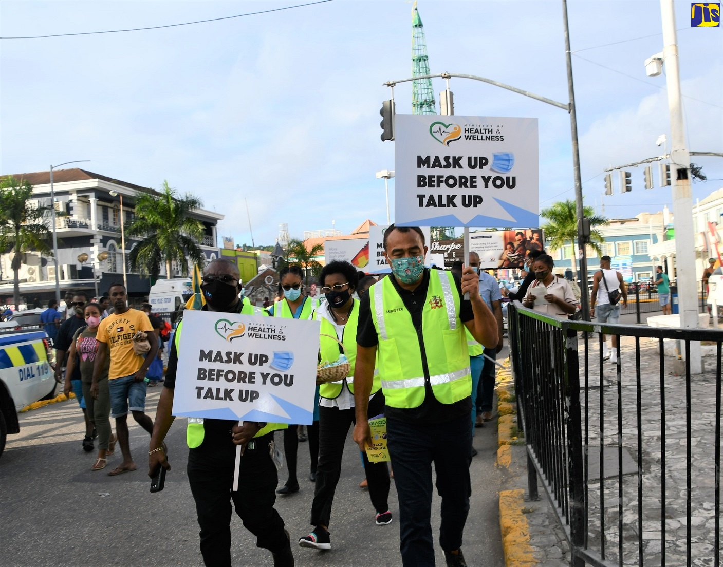 Minister of Health and Wellness, Dr. the Hon. Christopher Tufton (right), leads a team of healthcare workers attached to the St. James Public Health Services through the streets of Montego Bay on Thursday (November 26), following the launch of the Ministry’s ‘Mask Up before You Talk Up’ public education campaign at Sam Sharpe Square.