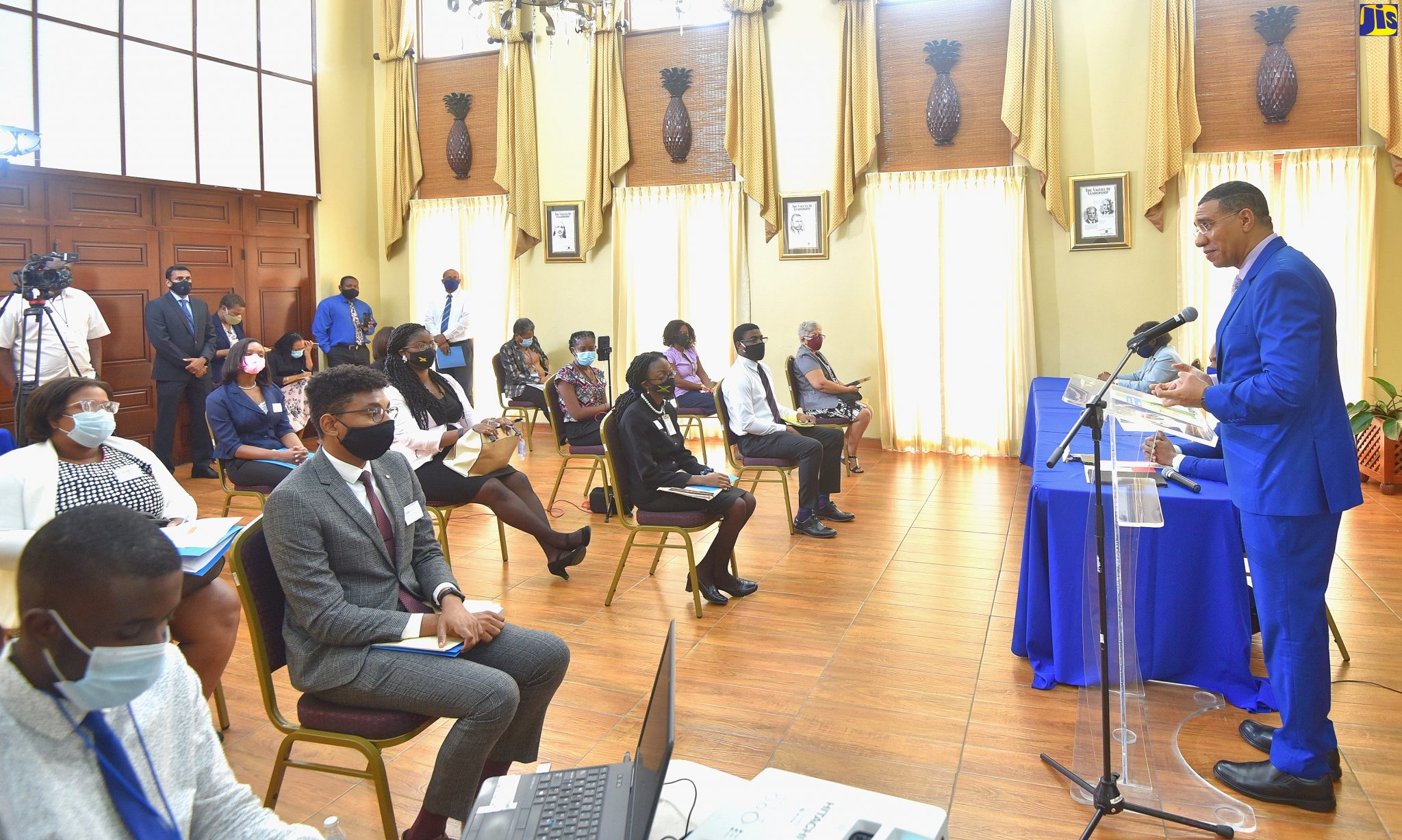 Prime Minister, the Most Hon. Andrew Holness (at podium), speaks at the orientation session for the second cohort of persons selected under the Jamaica House Fellowship Programme, at Jamaica House, on November 11.